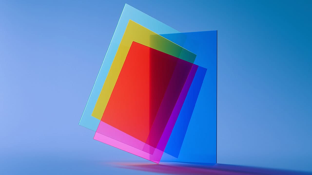 Coloured glass panels overlapping, the overlap darker and richer than any single panel